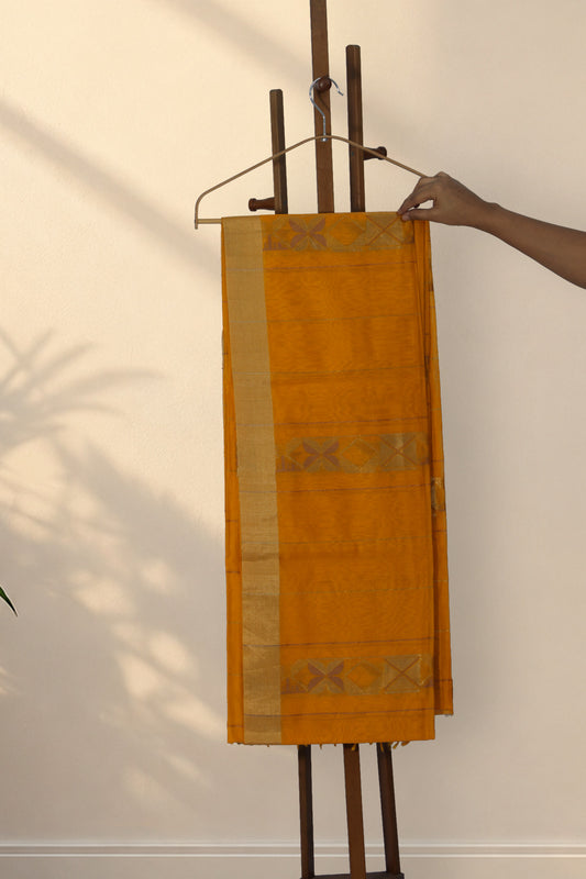 Turmeric yellow Chanderi cotton silk saree with geometric vertical panels