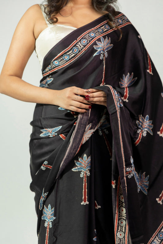 Black and indigo Ajrakh modal saree with hand block printed palm tree motifs