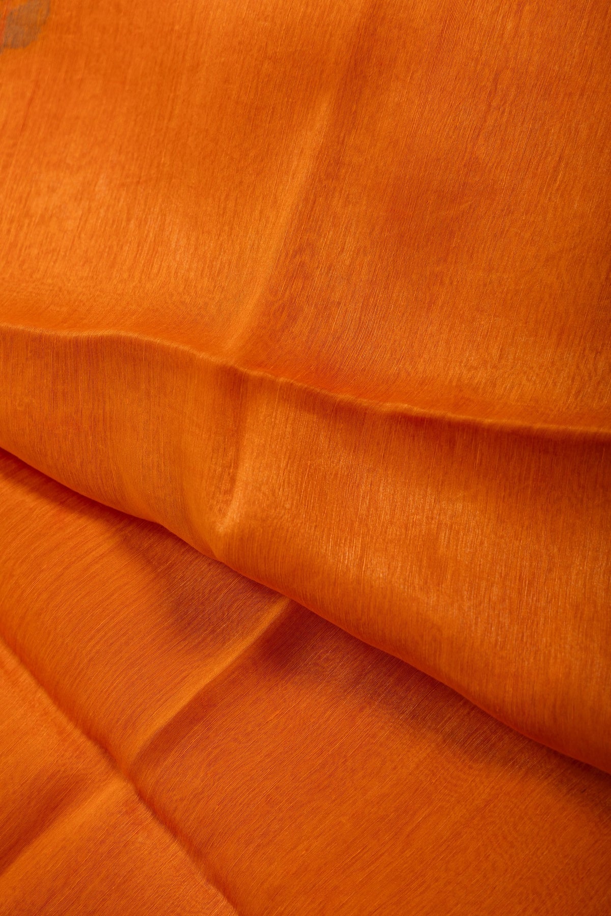 Woven peacock Jamdani pallu on Agun Pakhi orange silk linen saree