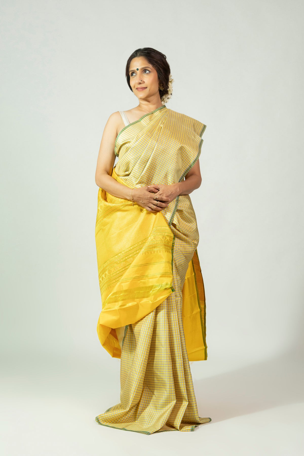 Arishina Chukki yellow Molakalmuru silk saree with contrast border