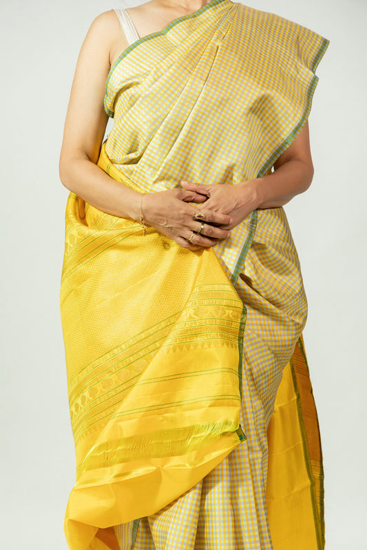 Yellow Molakalmuru silk saree with woven body details