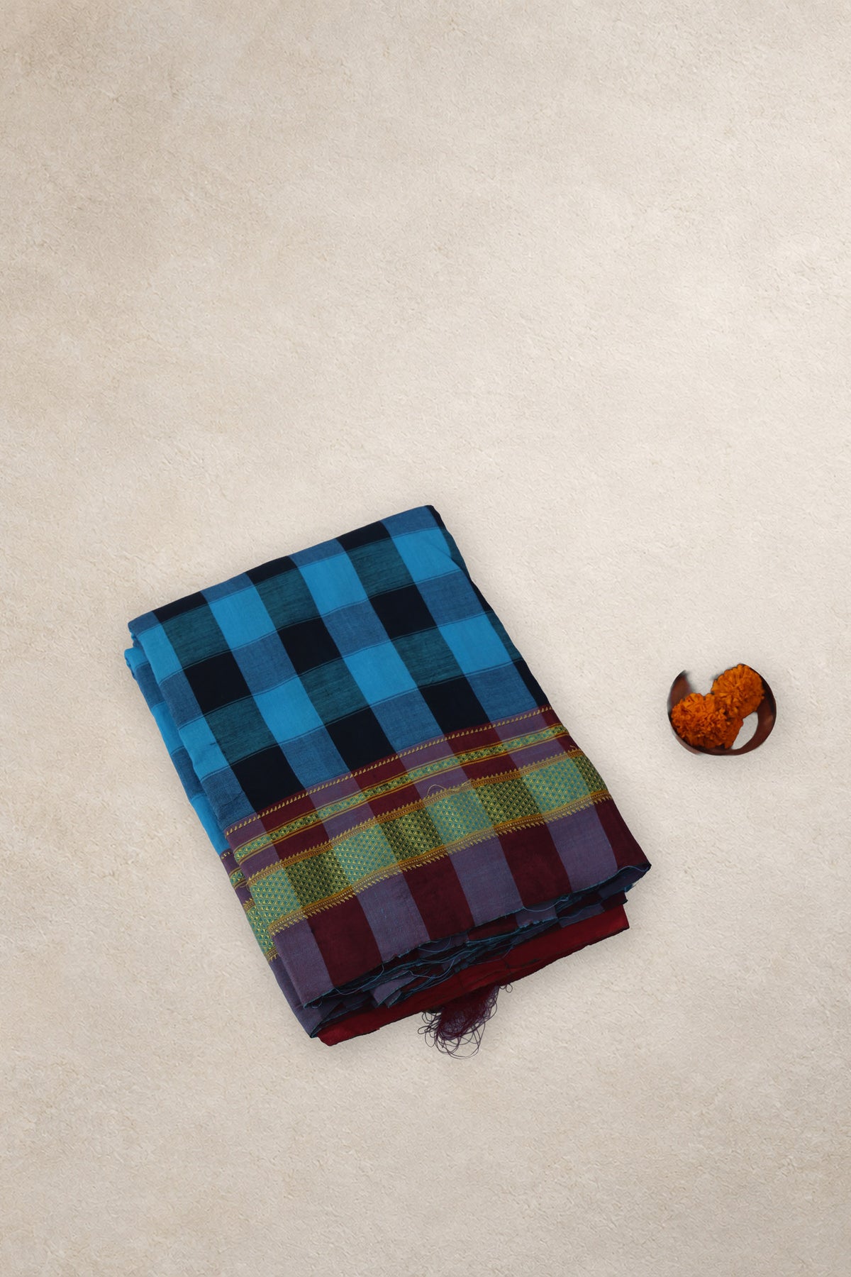 Neeli Chowka blue and black check Ilkal cotton saree with red silk pallu