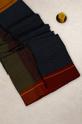 Green and black striped pallu of Kumkuma Arishina cotton saree