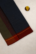 Close up of black white checks and red yellow Ganga Jamuna border