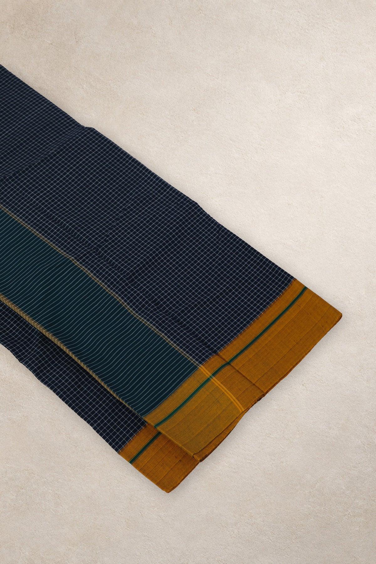 Beige and green pallu with horizontal lines on Bevu Bella saree