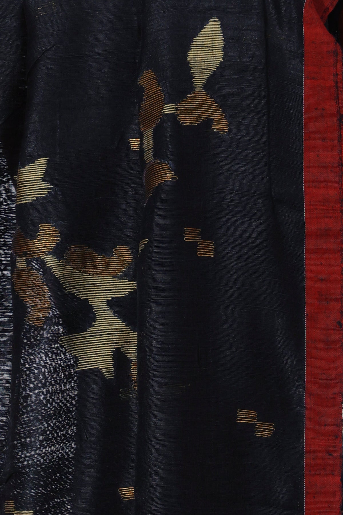 Gold striped pallu of Kalo Heera black Matka silk Jamdani saree