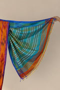 Silk ikat border on Komola Neel orange Kalakshetra saree