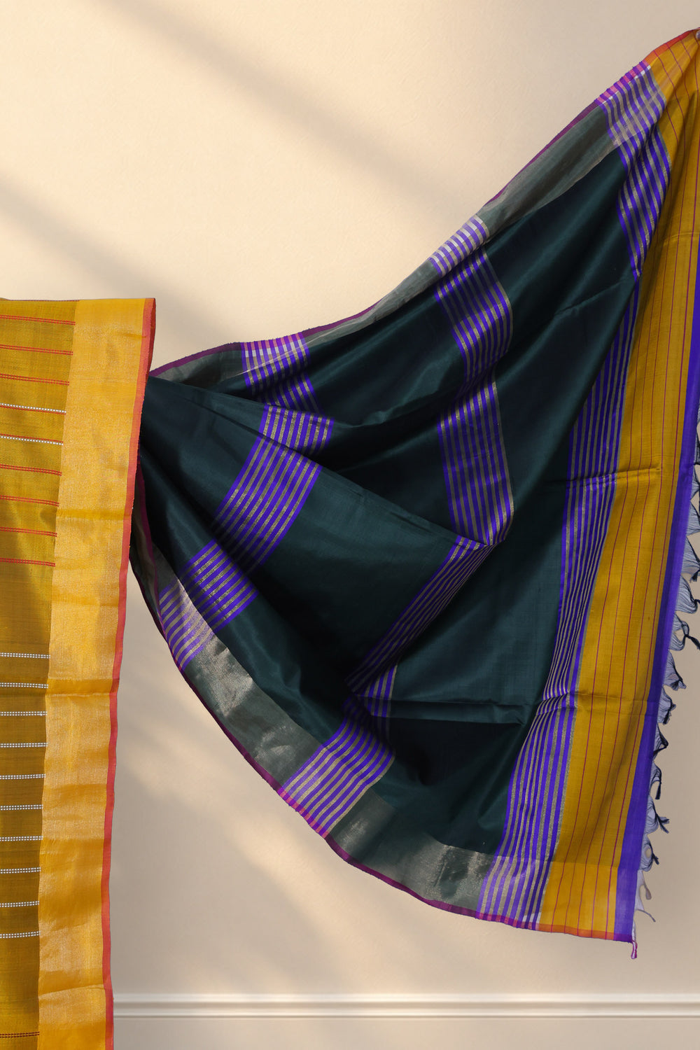 Zari border on Dhaner Khet mustard yellow silk saree