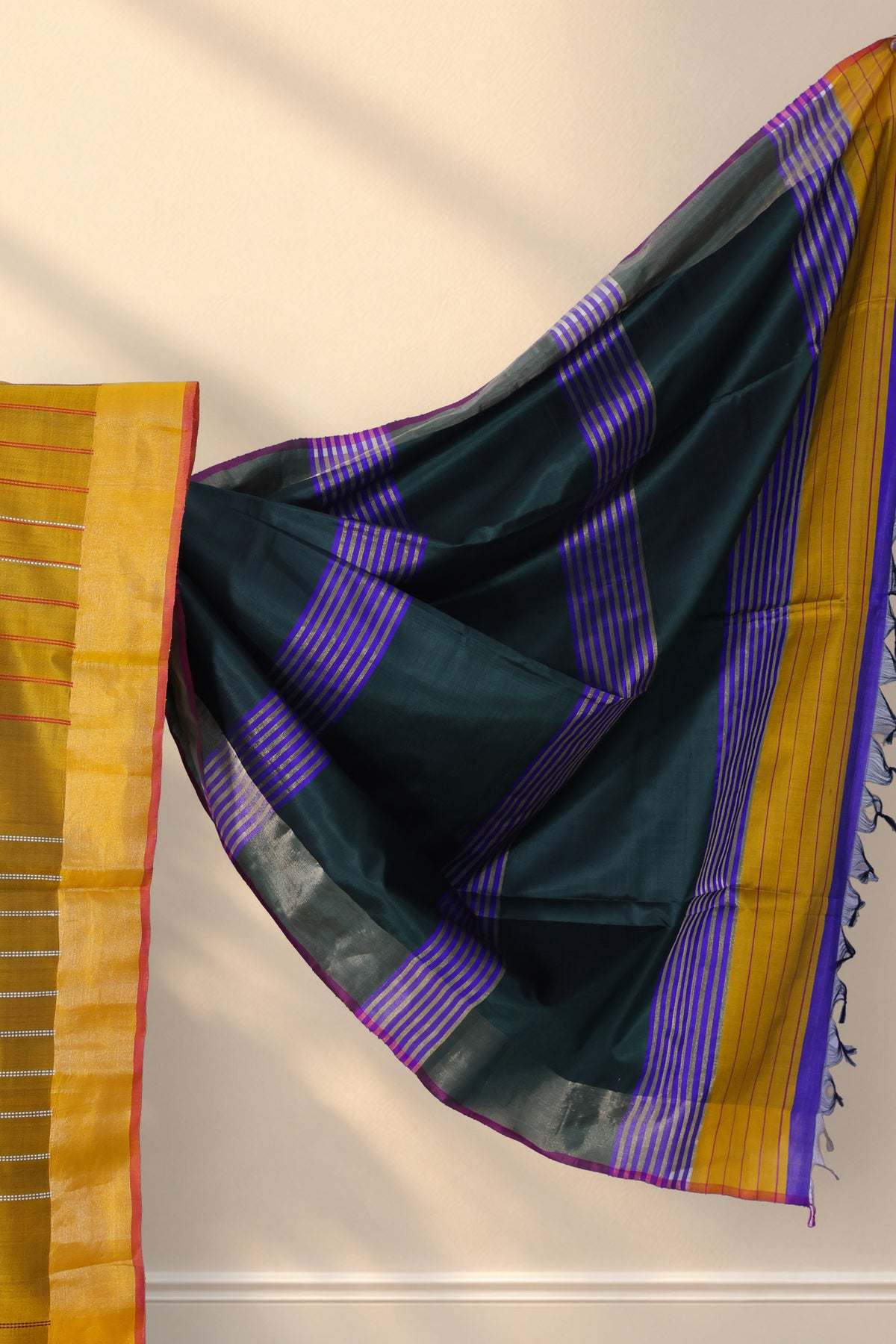 Zari border on Dhaner Khet mustard yellow silk saree