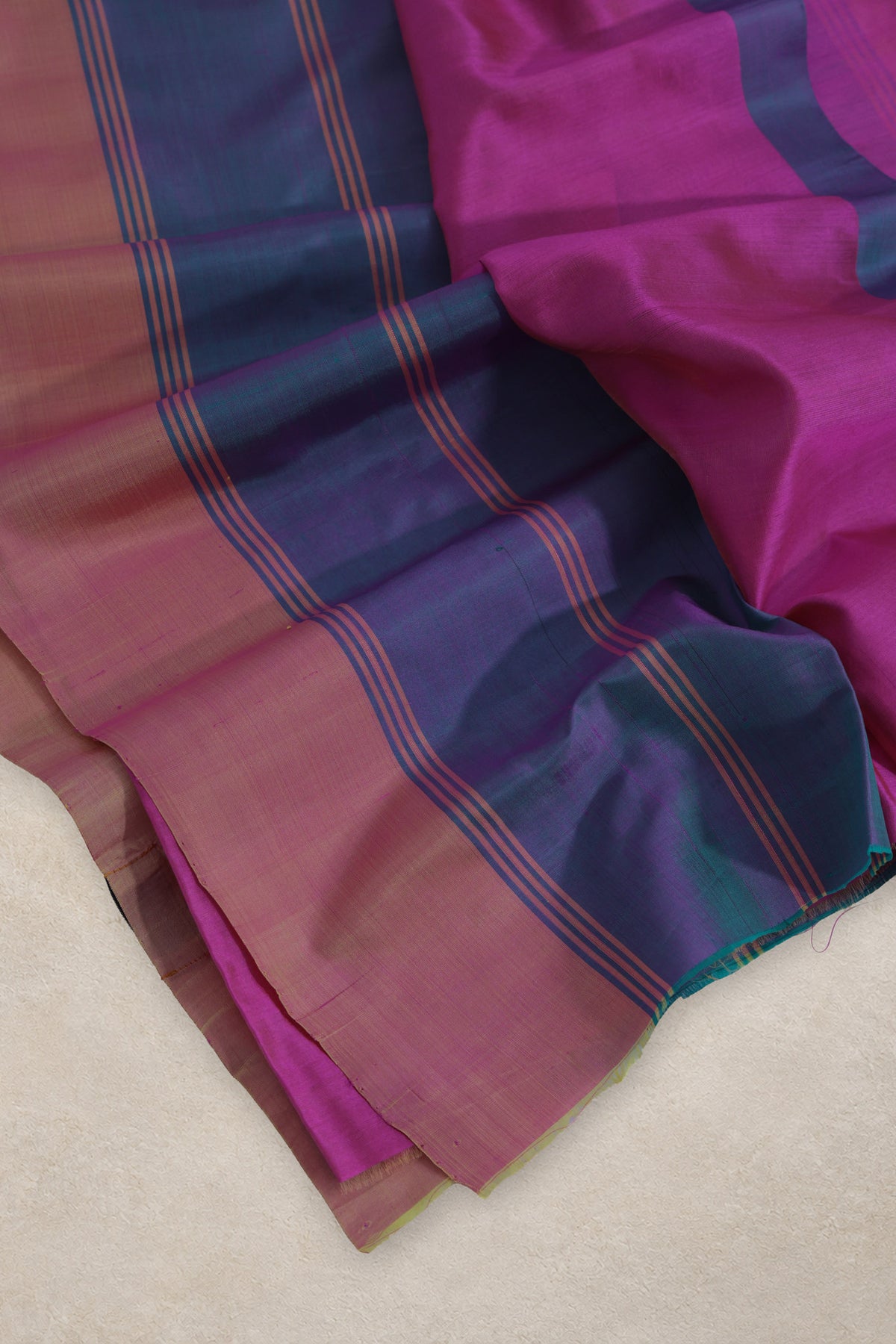 Gold zari pallu of Dhoop Chhaon shot pink Chanderi silk saree
