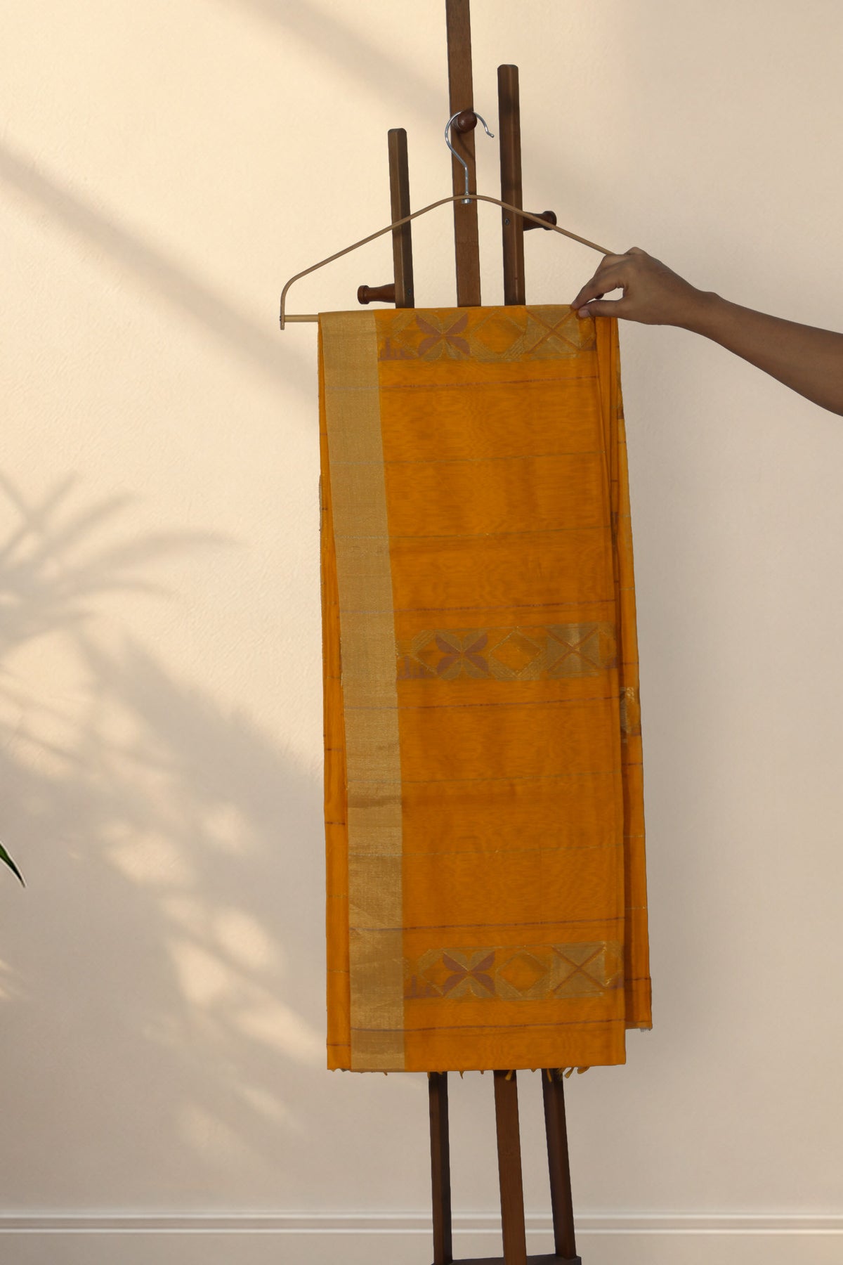 Turmeric yellow Chanderi cotton silk saree with geometric vertical panels