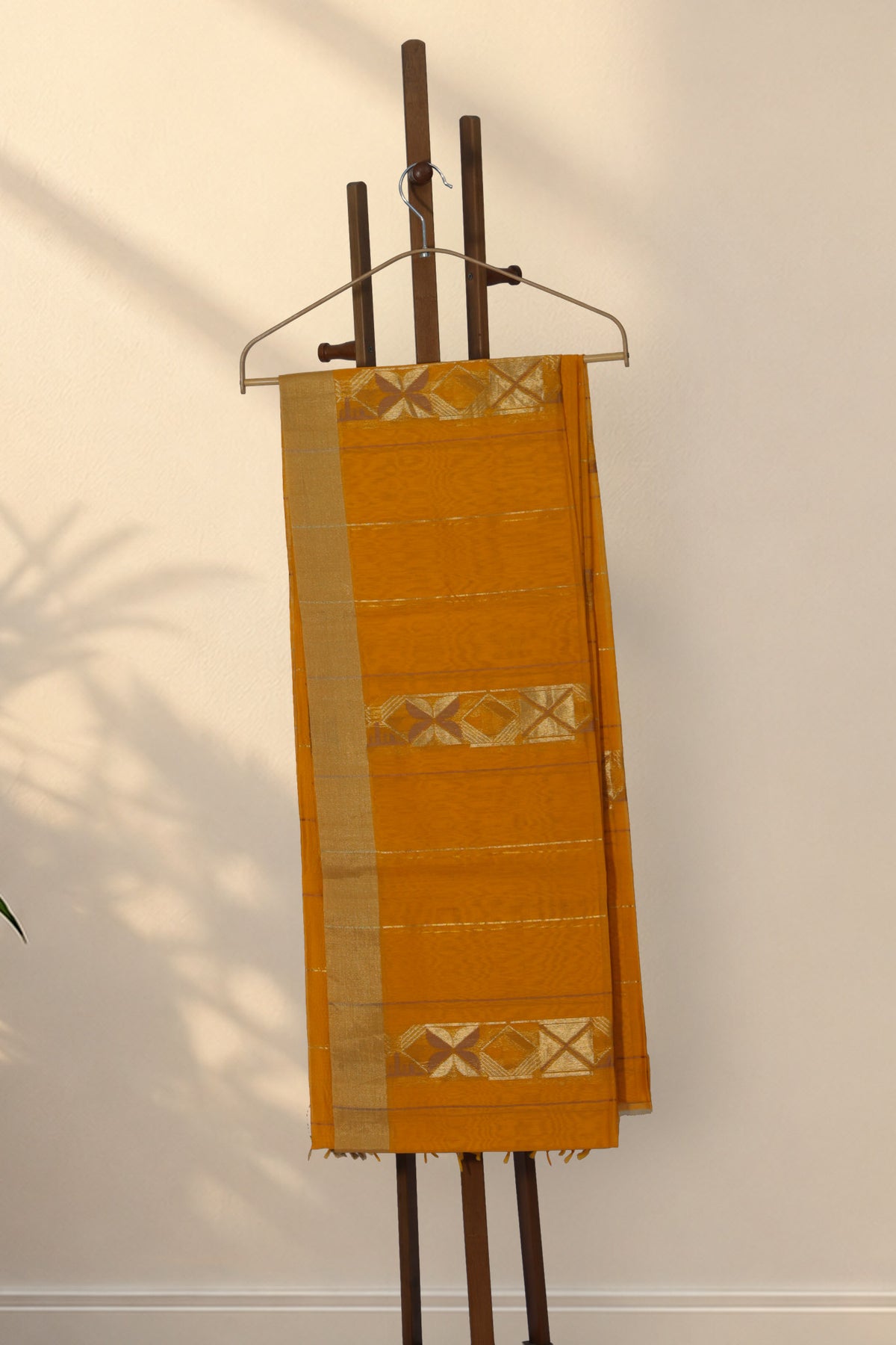 Gold zari border on Haldi Sona turmeric yellow Chanderi saree