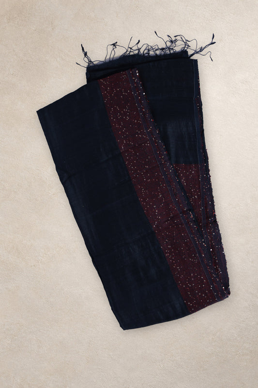 Jonaki Raat black Matka silk saree with red thread and gold sequin border