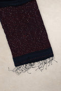 Red thread and gold sequin border on Jonaki Raat black Matka silk saree