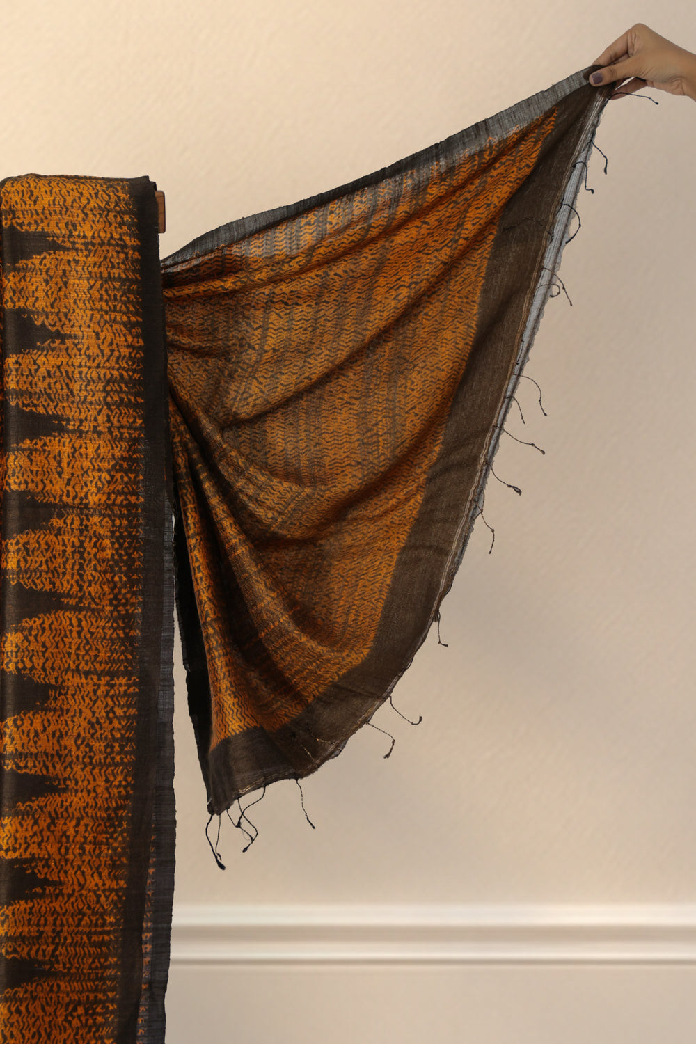 Orange and brown temple Shibori border on Agun Mati Matka silk saree