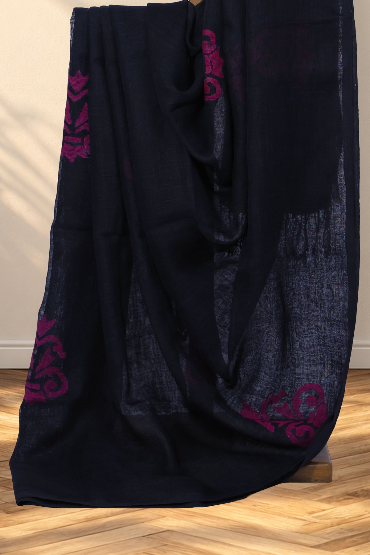 Borderless black handloom linen saree with woven fuchsia geometric motifs
