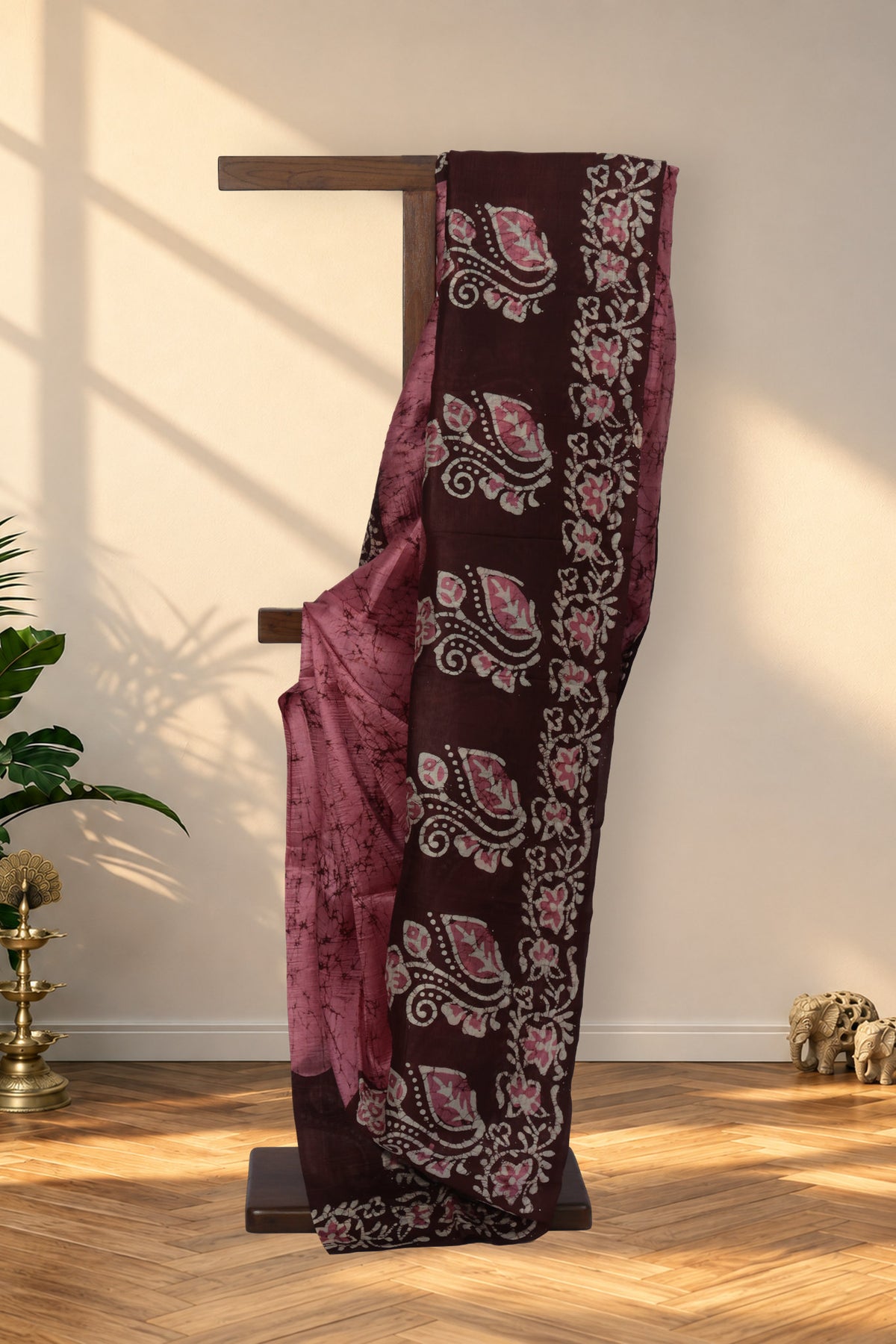 Jaba Bagan pink Batik silk saree with maroon crack work and floral pallu