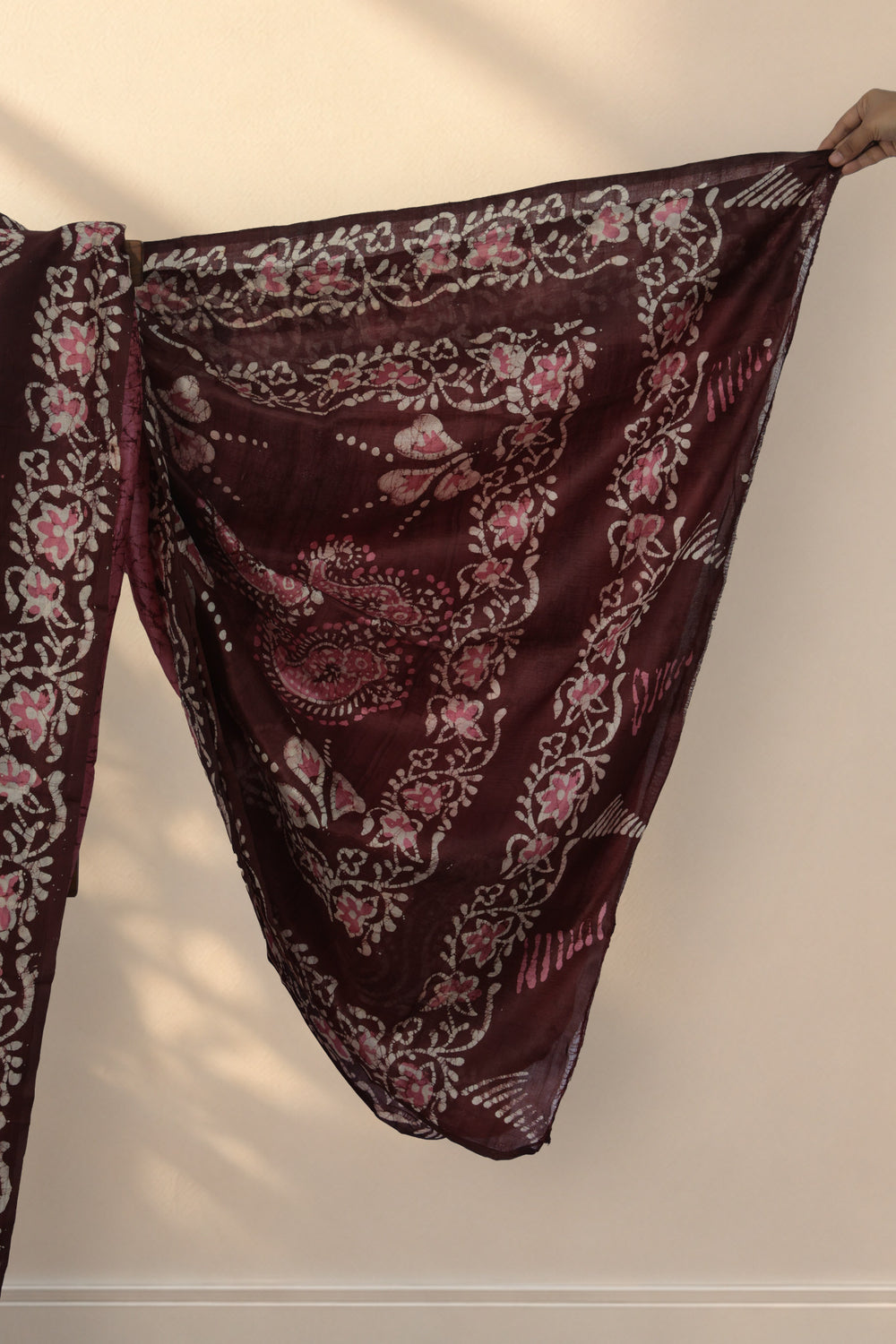 Maroon floral Batik border on Jaba Bagan pink silk saree
