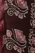 Close up of maroon wax resist crack Batik on pink Bangalore silk