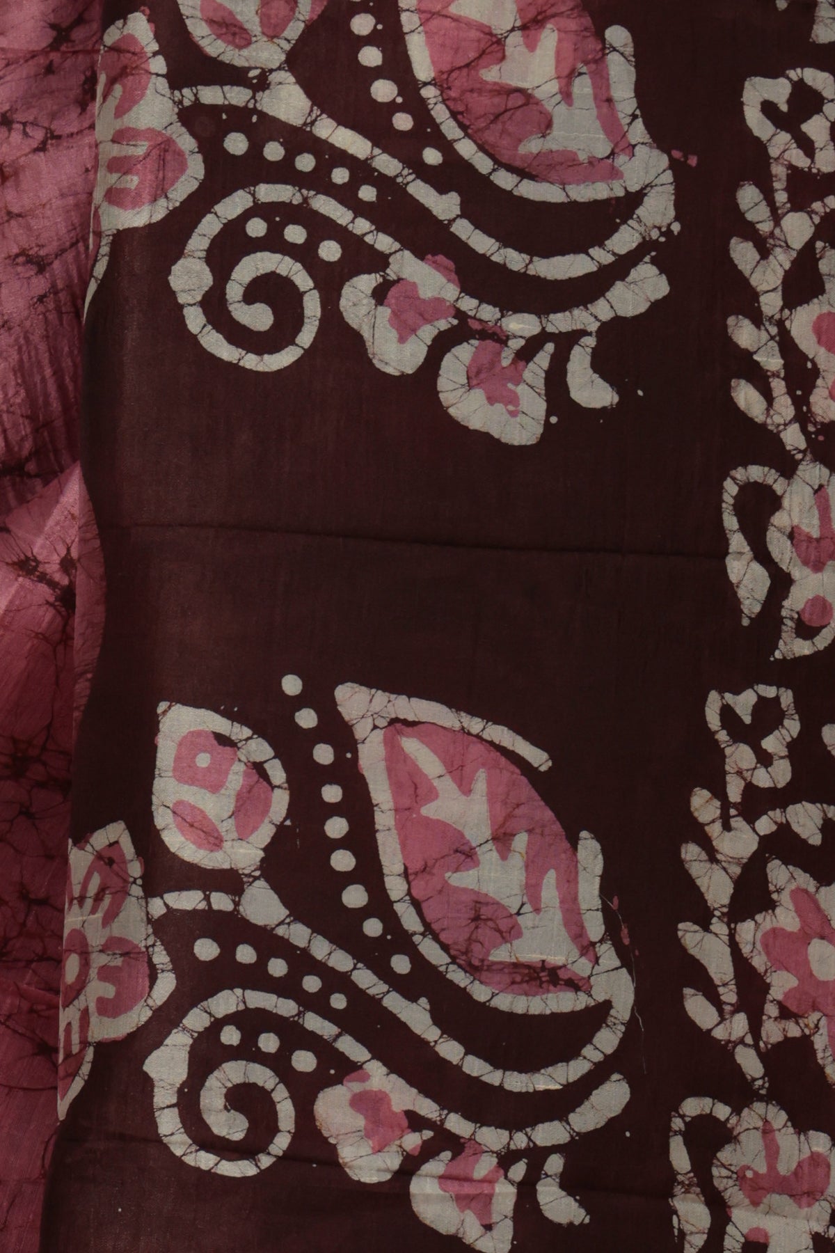 Close up of maroon wax resist crack Batik on pink Bangalore silk