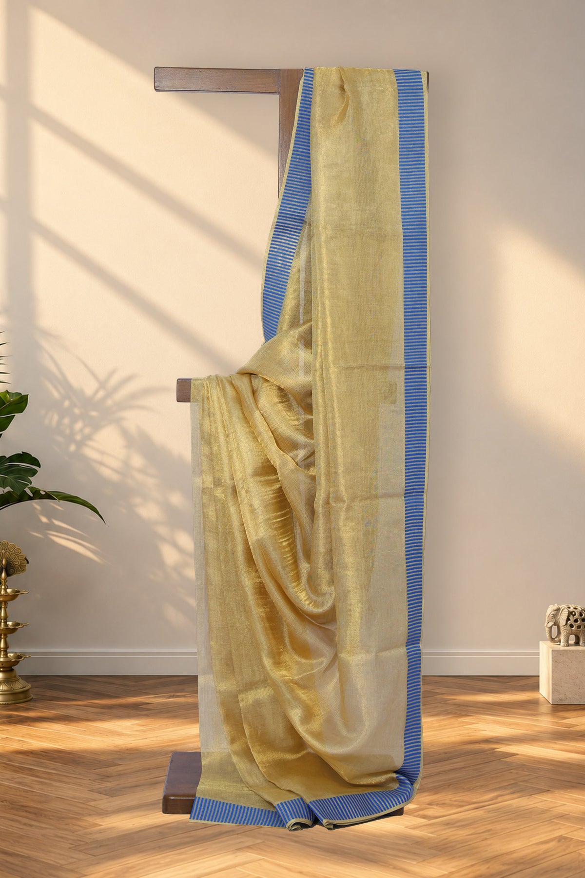 Subarnarekha tissue gold Tussar silk saree with blue and gold striped border