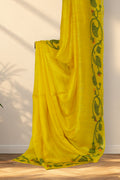 Yellow Matka silk saree with plain body and multicolour floral border