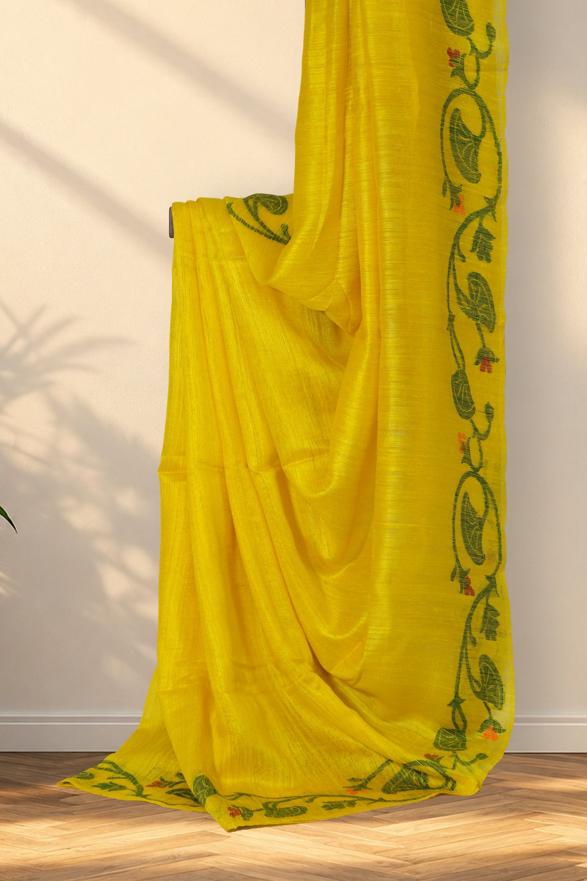 Yellow Matka silk saree with plain body and multicolour floral border
