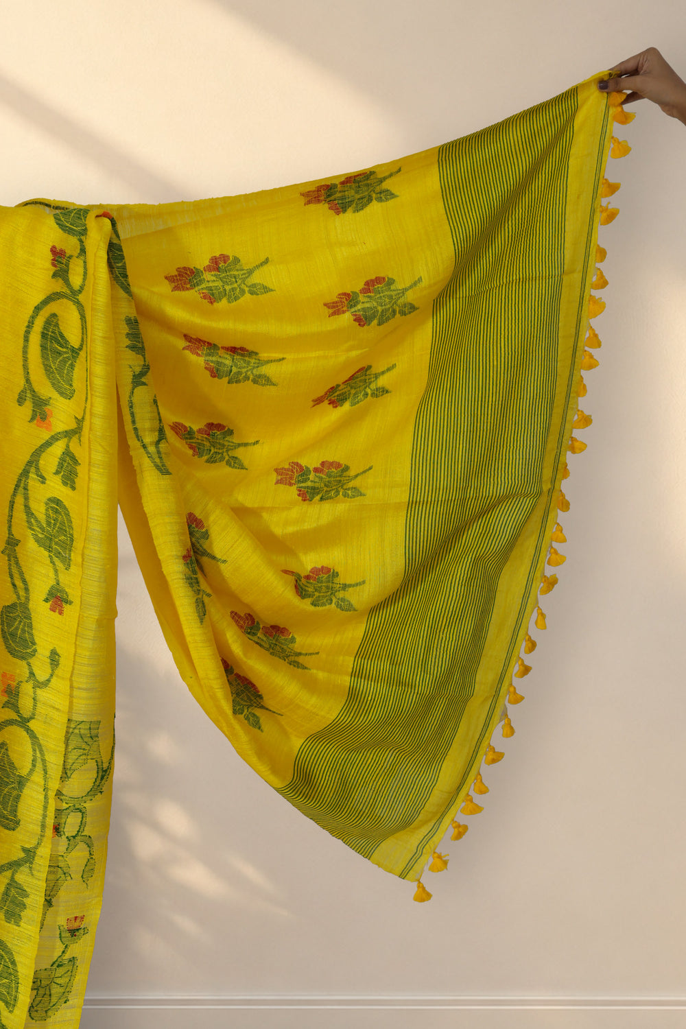 Yellow red and green floral pallu of Sorshe Khet Matka silk saree