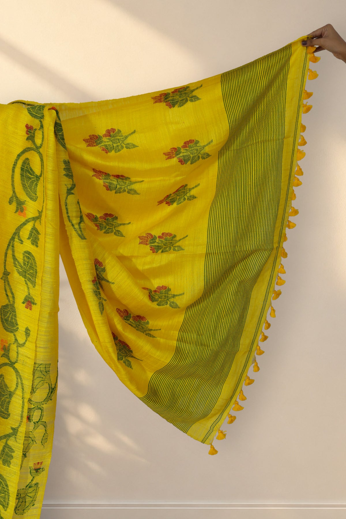 Yellow red and green floral pallu of Sorshe Khet Matka silk saree