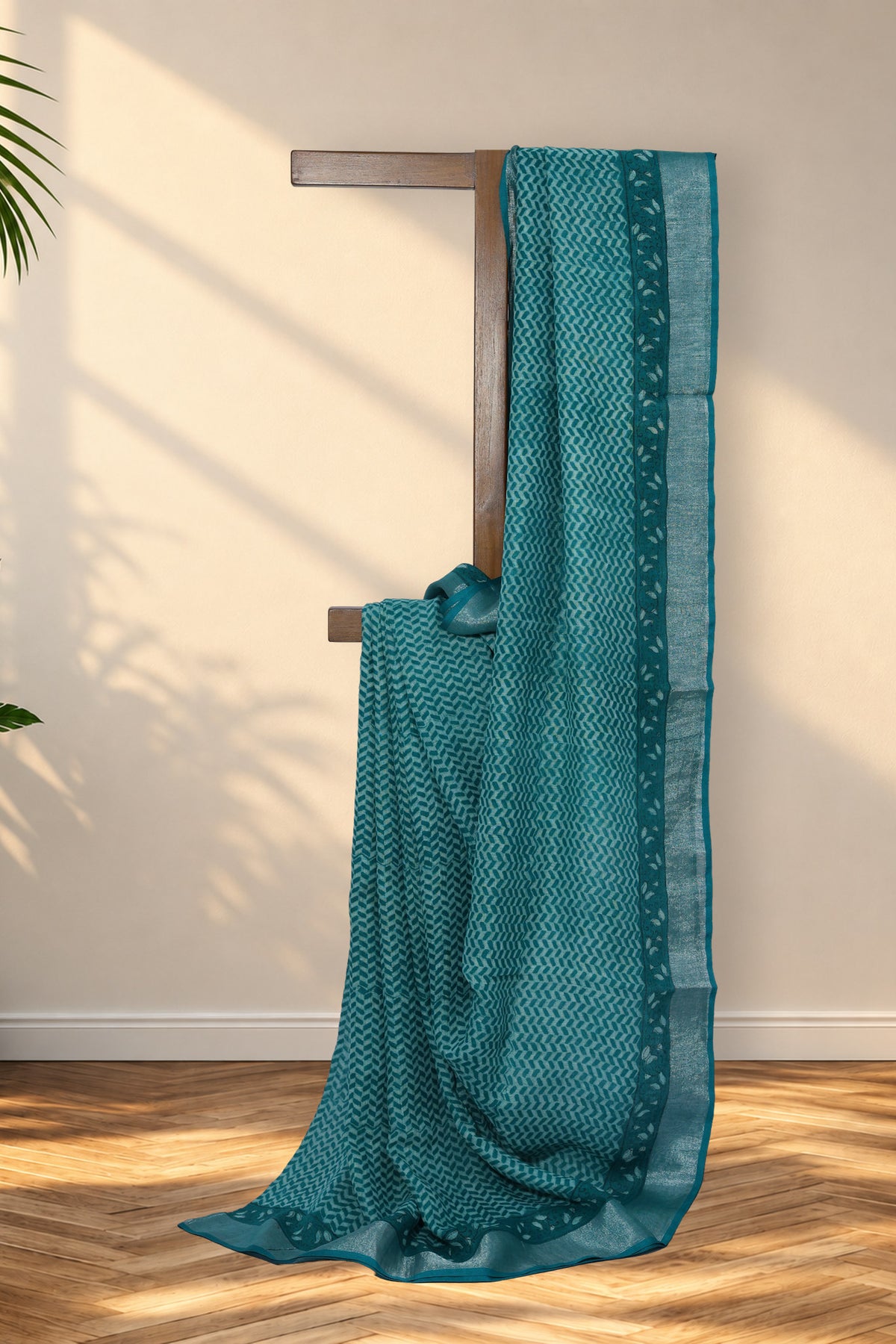 Hari Jaali green Dabu linen saree with silver zari border