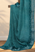 Green Dabu linen saree with small geometric hand block printed pattern
