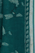 Leaf motif striped pallu of Hari Chahak green Dabu linen saree