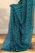 Green Kota silk Dabu saree with leaf motifs printed across the body