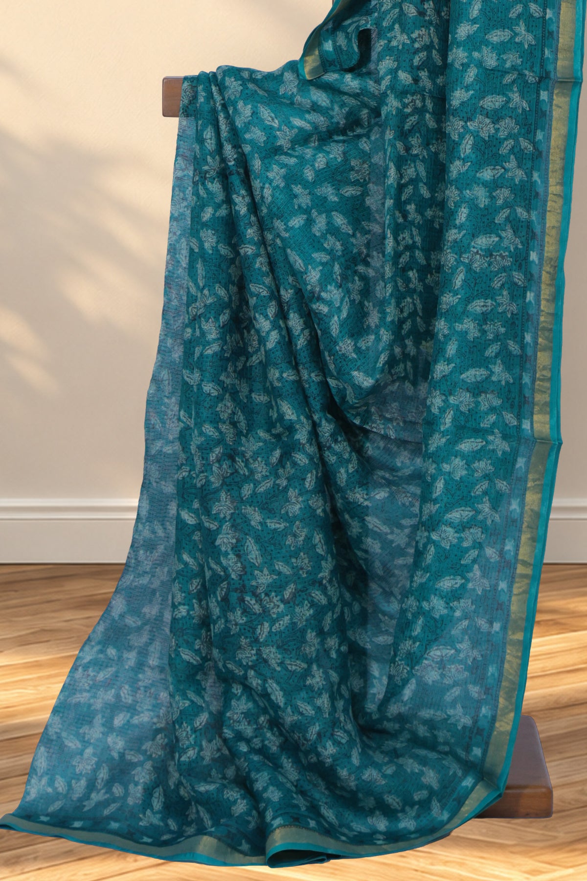 Green Kota silk Dabu saree with leaf motifs printed across the body