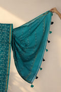 Thin golden zari border on Patti Bel green Dabu silk saree