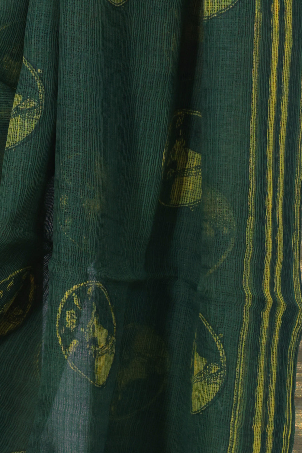 Green black and yellow striped pallu of Van Chakra Dabu saree