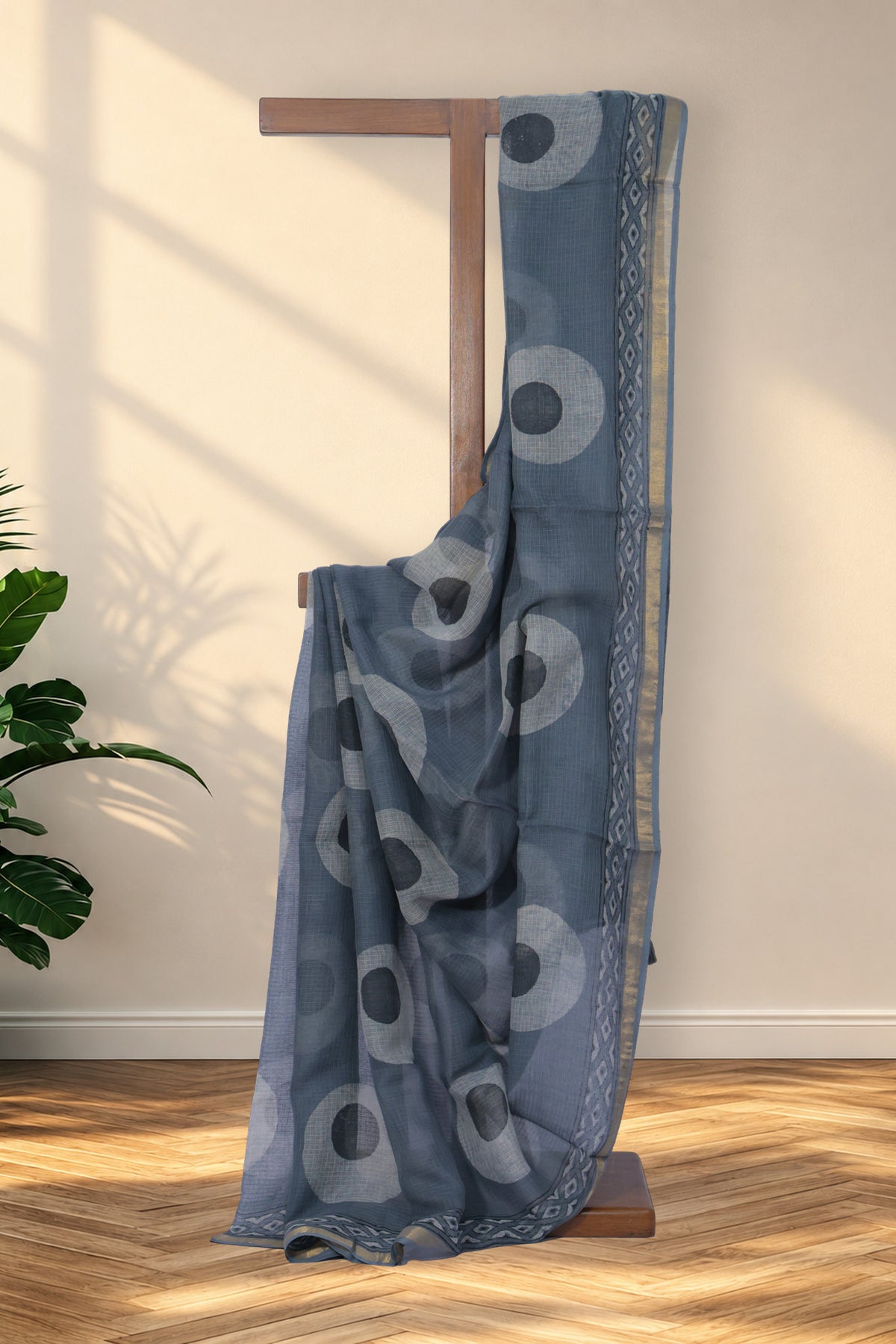 Chakri grey Dabu Kota Doriya saree with black and white circular motifs