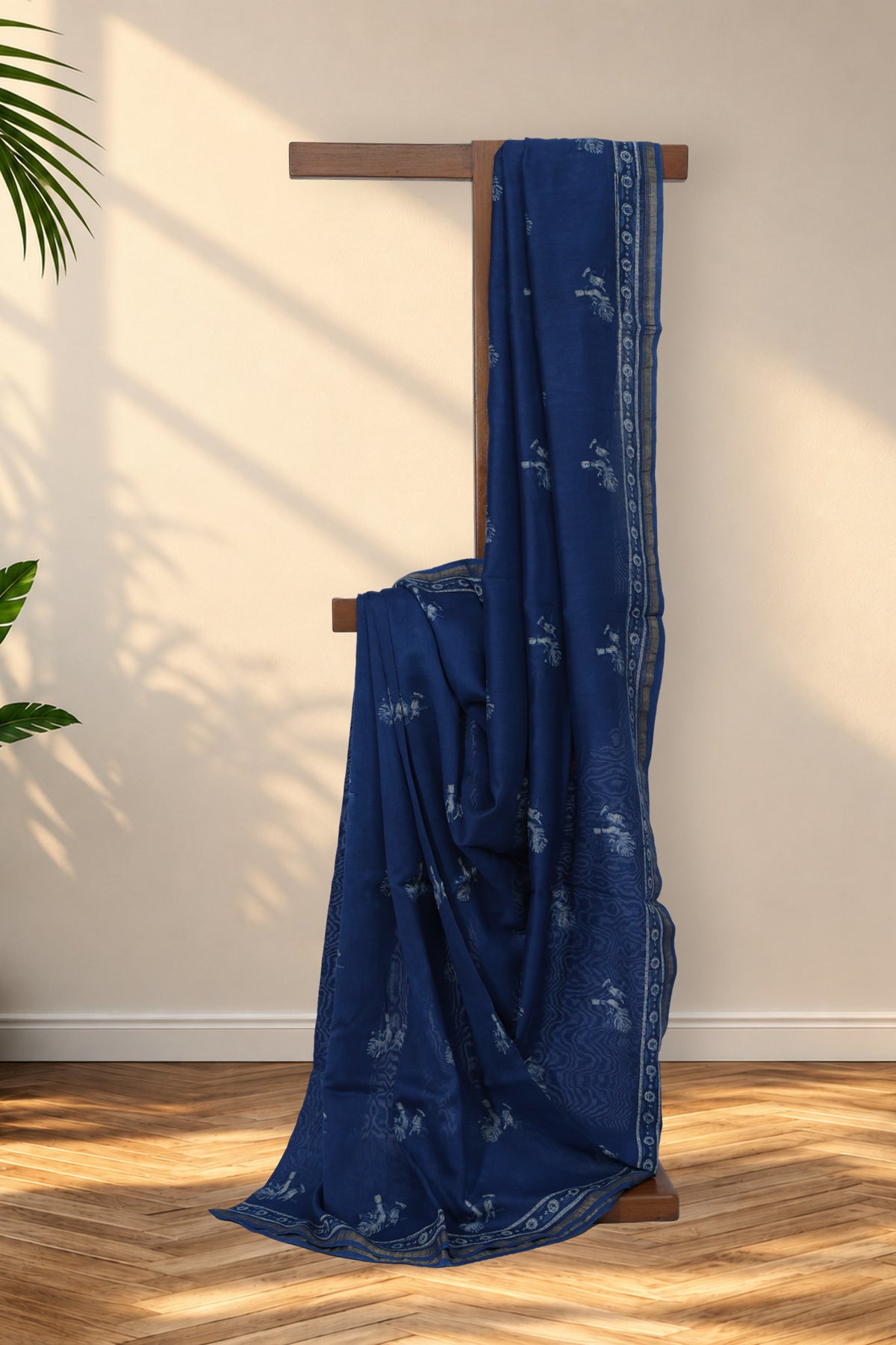 Bansuri Neel indigo Dabu Chanderi silk saree with flute and peacock feather motifs