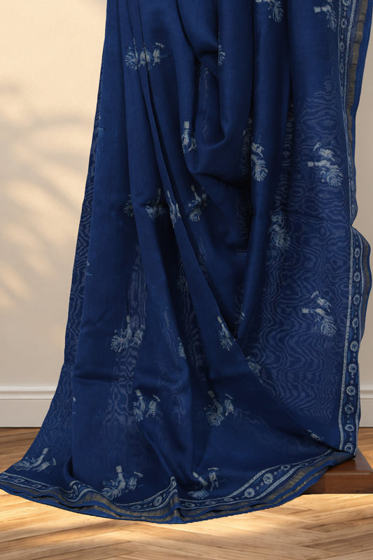 Indigo Dabu Chanderi silk saree with hand block printed flute and peacock feather motifs