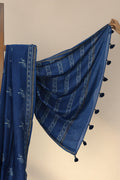 Golden zari and flower border on Bansuri Neel indigo Dabu saree