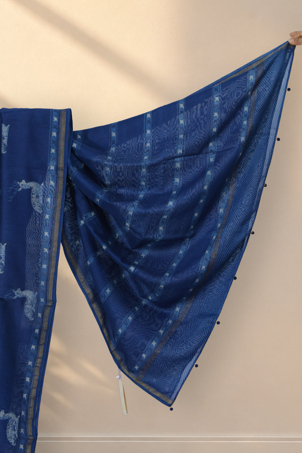 Golden zari motif border on Hiran Neel indigo Dabu saree