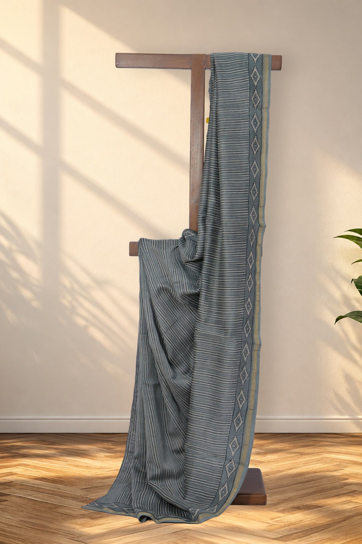 Dhuaan Dhaari grey Dabu Chanderi silk saree with vertical stripes