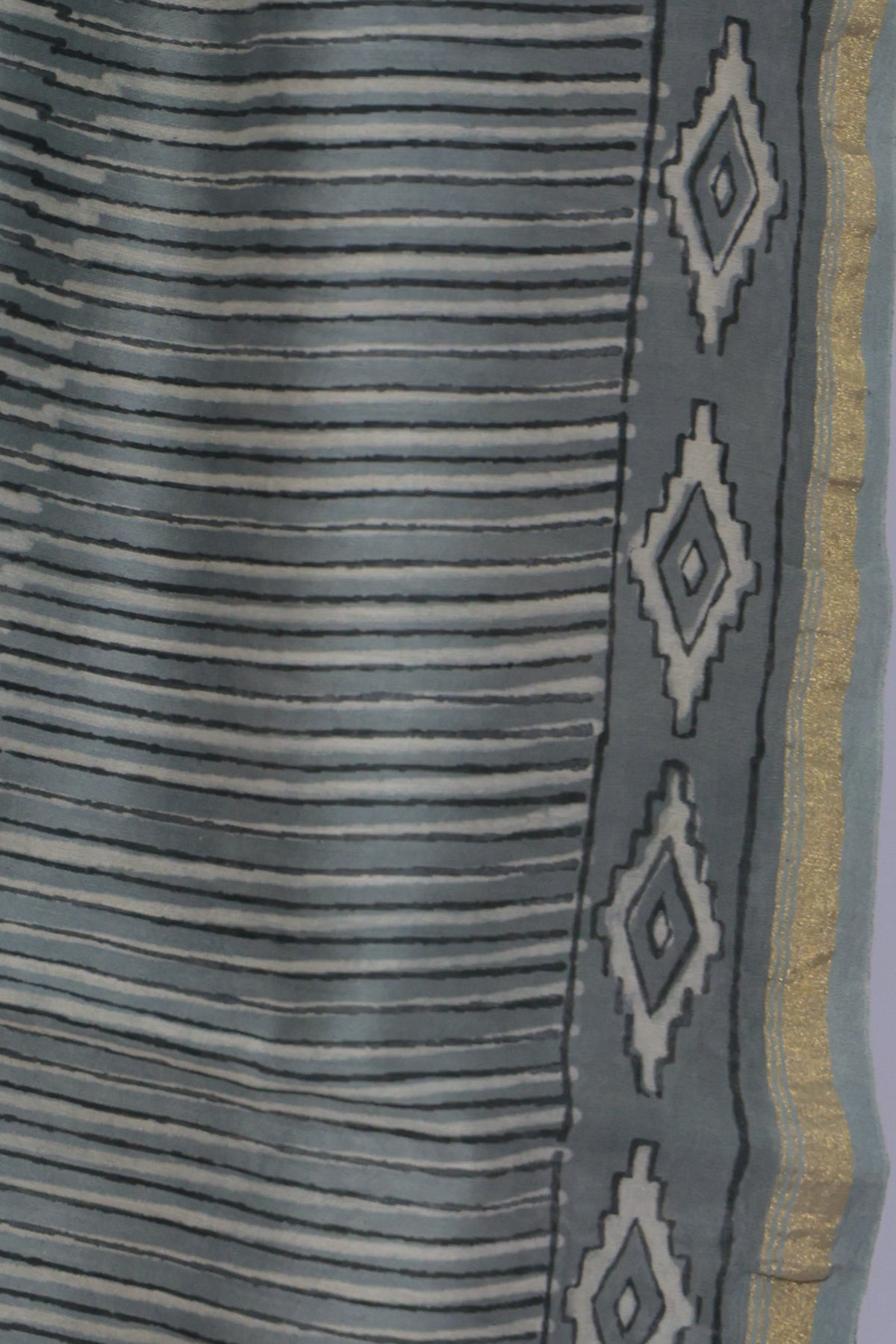 Zari panels and diamond motif pallu of Dhuaan Dhaari Chanderi silk saree