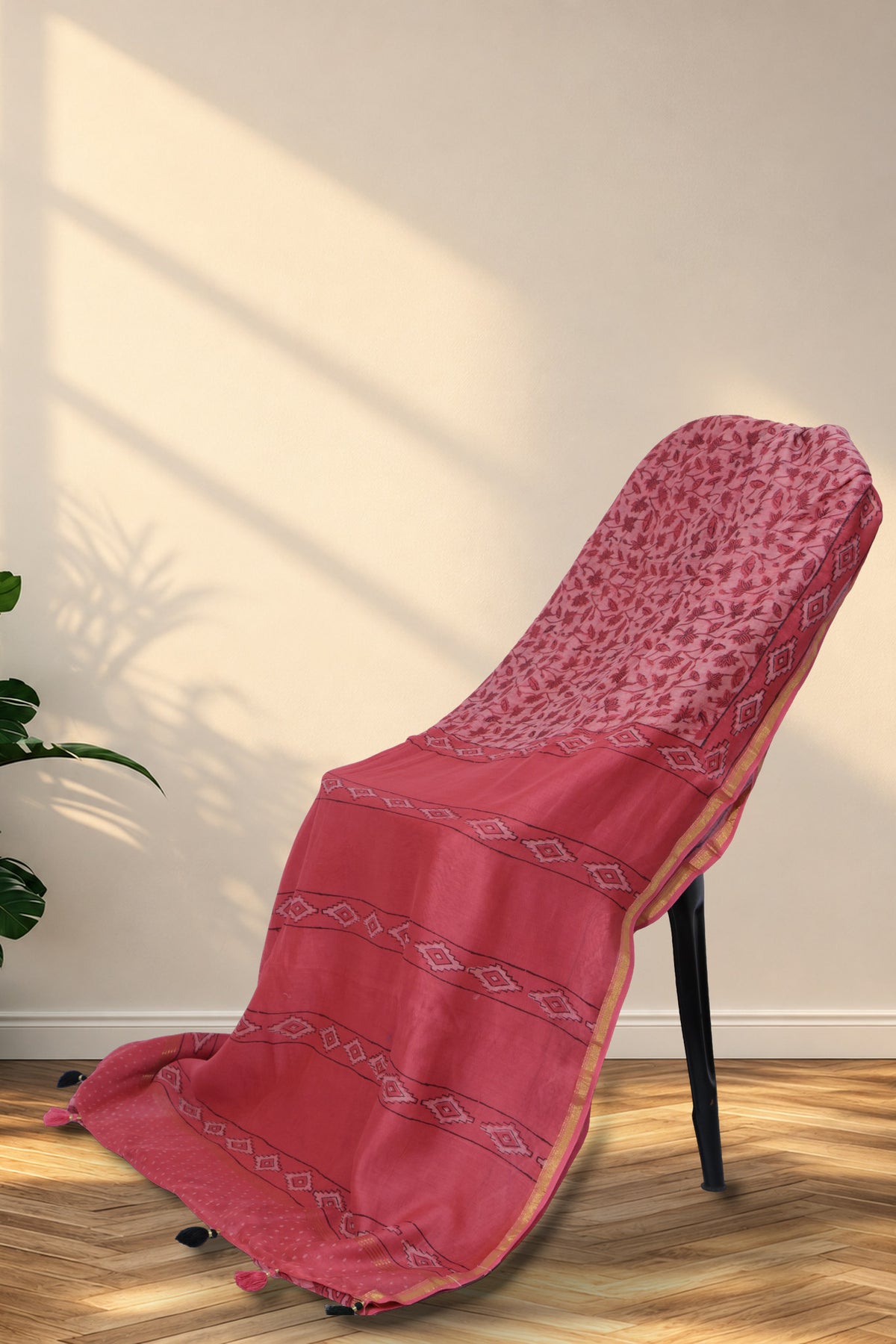 Diamond motif panels and polka dot pallu of Gulabi Kamal Dabu saree