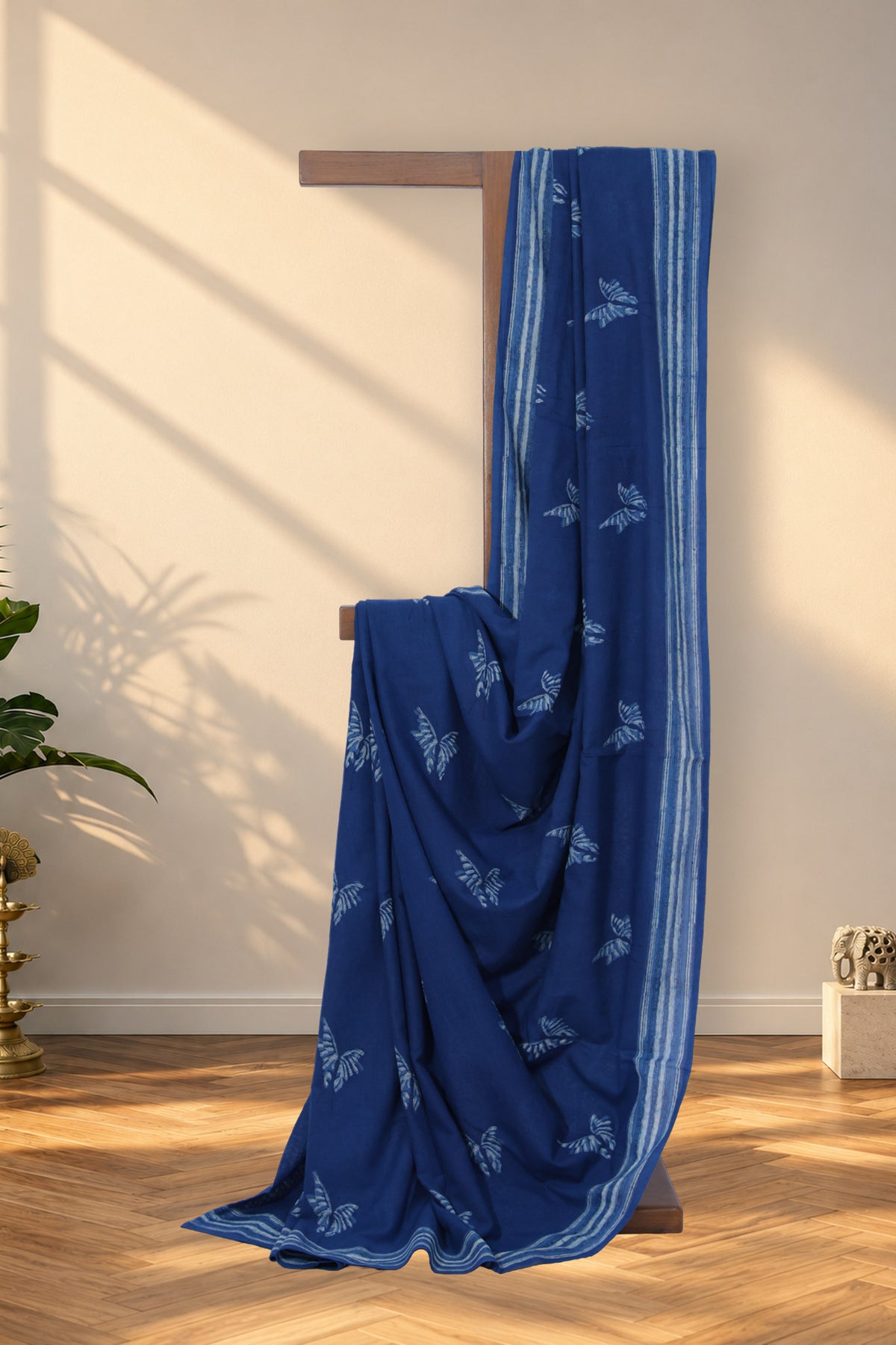 Neeli Titli indigo Dabu Mul Cotton saree with butterfly motifs