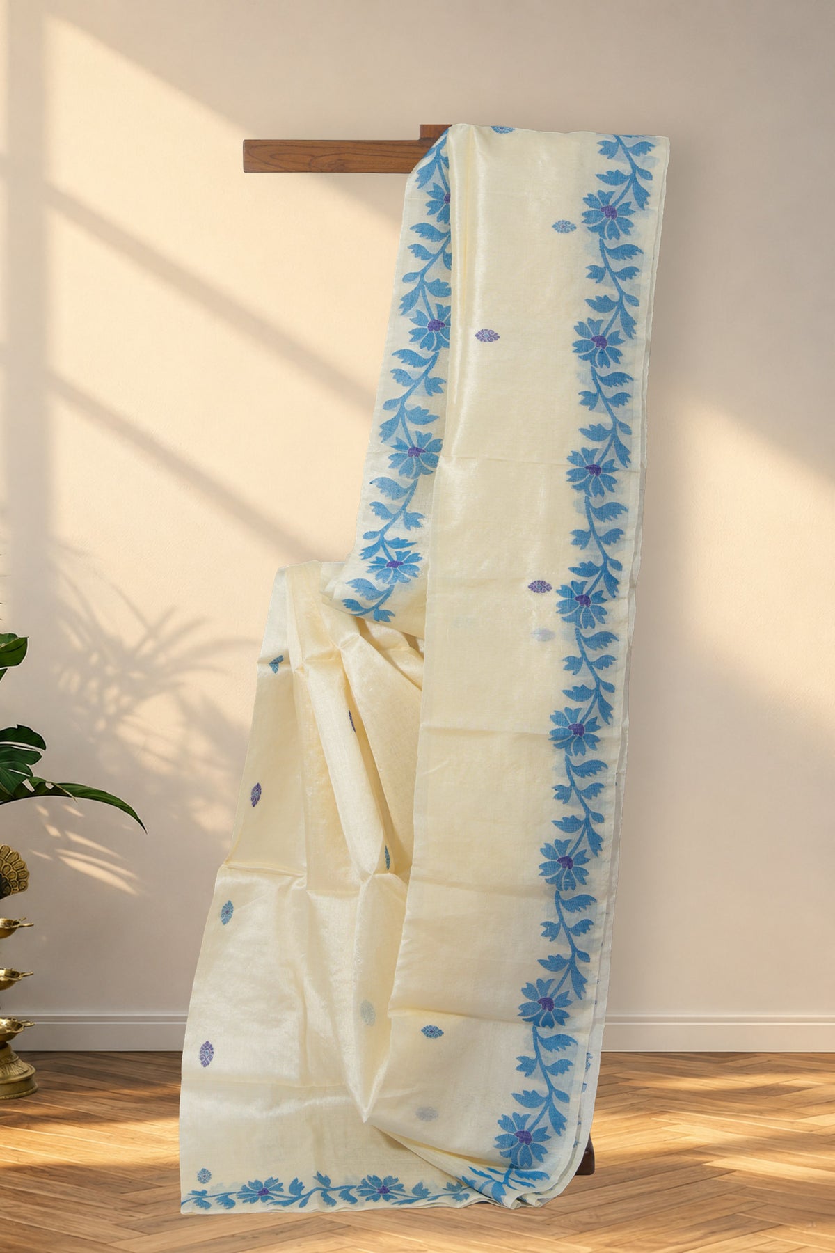 Aparajita beige Tussar silk Jamdani saree with blue and indigo buttis