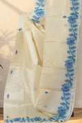 Beige Tussar silk saree with blue and indigo buttis all over