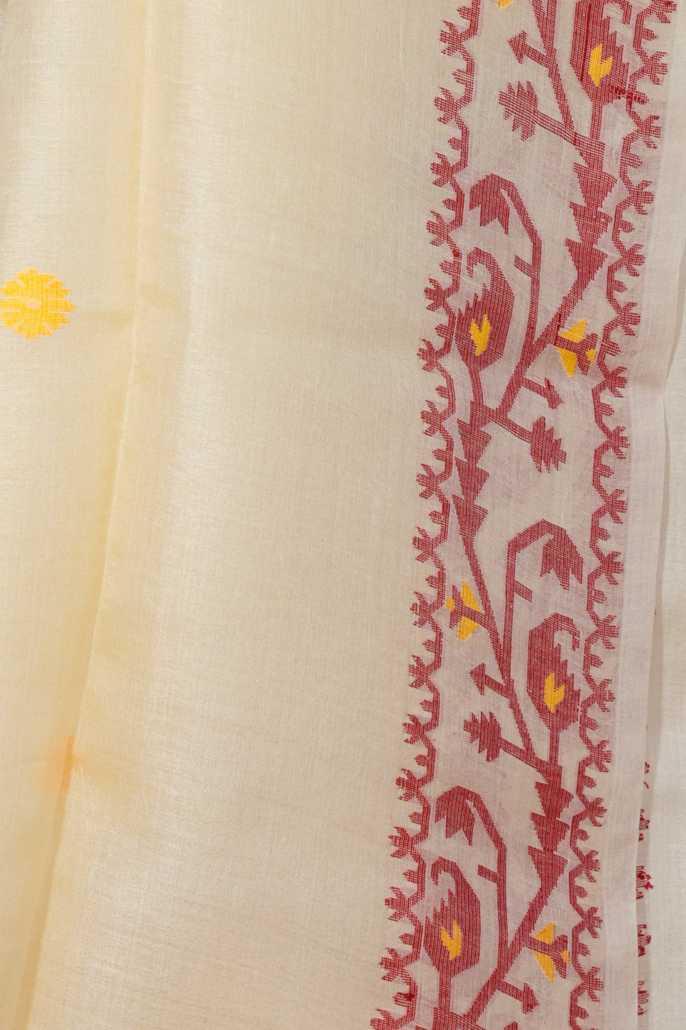 Red geometric motif border on Rongon Buti beige Tussar silk saree