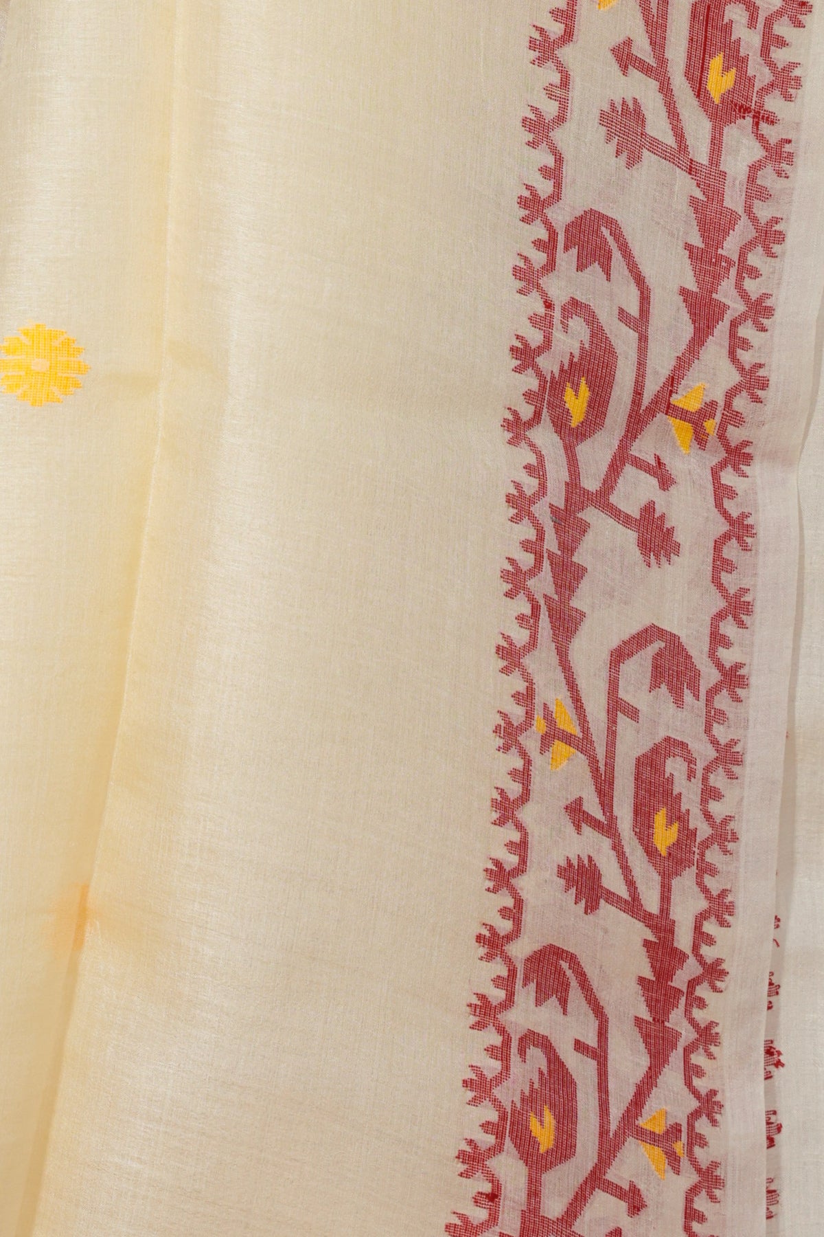 Red geometric motif border on Rongon Buti beige Tussar silk saree