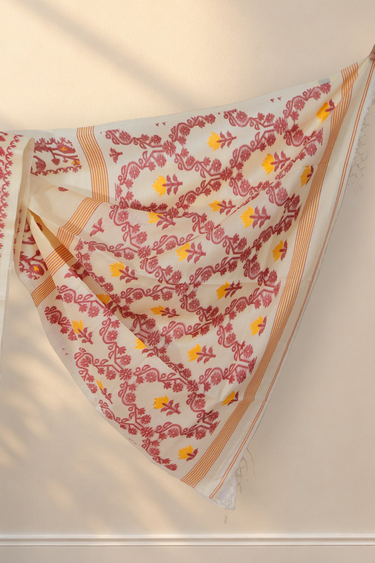 Red and yellow geometric striped pallu of Rongon Buti Tussar silk saree